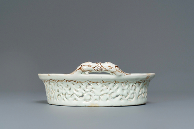 A polychrome Brussels faience '&agrave; la haie fleurie' reticulated basket, 18th C.